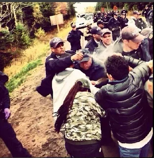 How does it feel to beat, aim guns and shoot unarmed people for protecting our possessions?